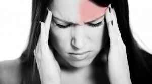 young woman with migraine