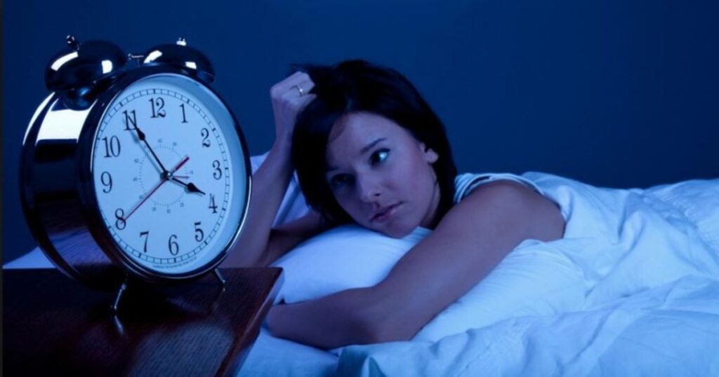 Woman suffering from sleeplessness.
